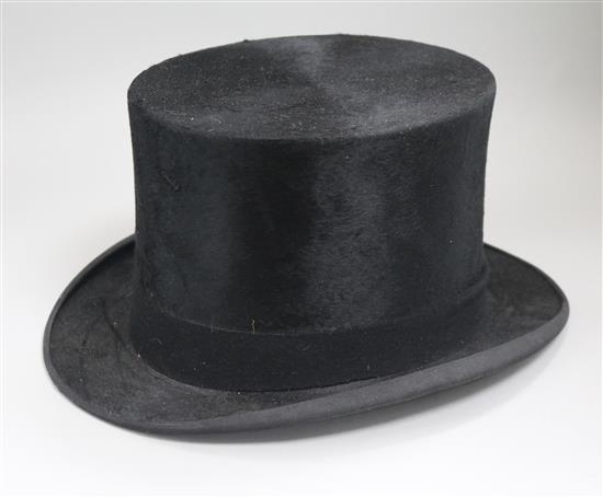 A boxed early 20th century silk top hat by Dunn and Co